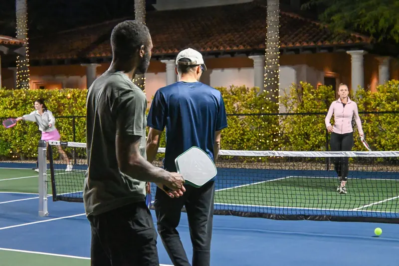 Energetic pickleball match under the lights in Scottsdale, Arizona